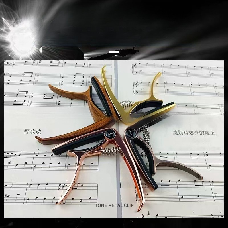 Металлический каподастр для эл – обзор и цена Musical Instrument Ending In A